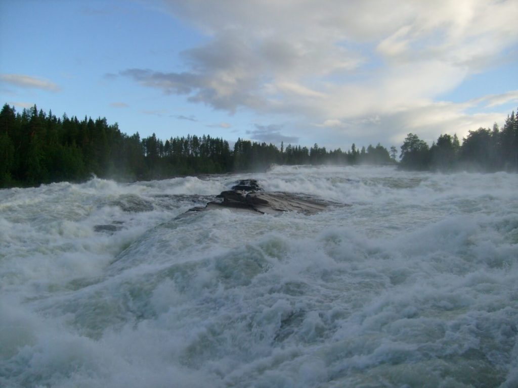 The masses of water flowing with great speed, while making a lot of noise